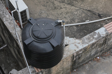 plastic water storage tank or overhead water tank on a terrace