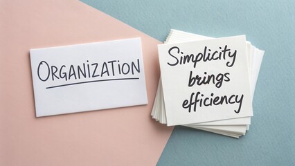 Inspirational Quote on a Note Card Promoting Organization and Simplicity for Efficient Workspaces
