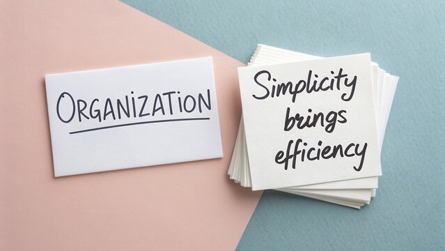 Inspirational Quote on a Note Card Promoting Organization and Simplicity for Efficient Workspaces