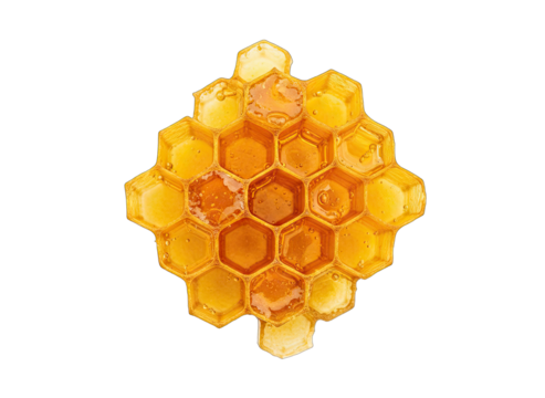 Hexagonal honeycomb structure filled with golden honey isolated on black background detailed natural food ingredient close up view