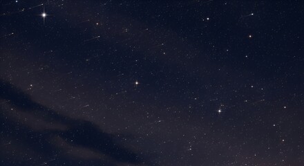 Captivating night sky with shimmering stars and subtle cloud formations