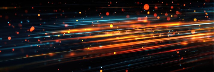 Abstract, dynamic visual featuring streaks of light, various colors over black. Particles are scattered throughout the scene