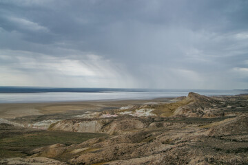 view of the coast of the sea. rain at sea
