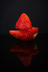 Vibrant Strawberry Slice with Reflection