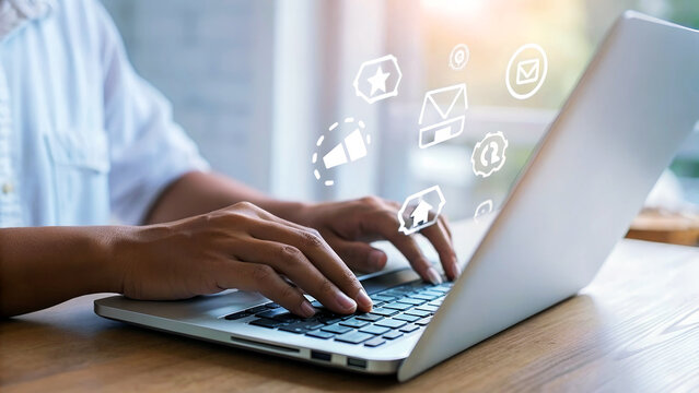 Dynamic businesswoman actively engaging with digital marketing icons while typing on a modern laptop in a bright, airy office space