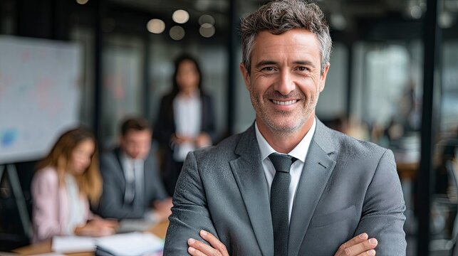 Confident executive smiling during a meeting with colleagues in a bright, modern office space, radiating leadership and success in the business world today