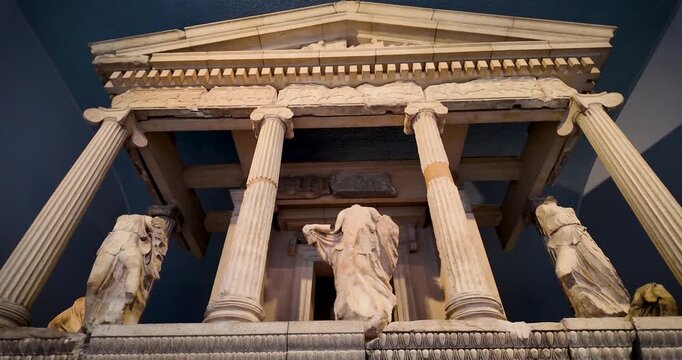 Panoramic video showcasing the intricate details of the Nereid Monument, a partial reconstruction of a Lycian tomb from ancient Xanthos dating to 380 BC