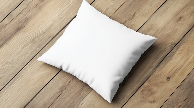 Blank white square cushion mockup resting on a diagonally laid natural wood plank floor