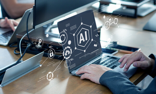 オフィスでノートパソコンを操作する手元とAIインターフェースのコンセプト