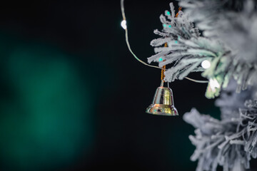 Christmas tree decorated with twinkling lights and snowflakes. Holiday concept.
