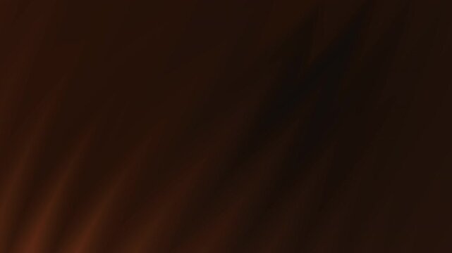 Deep brown hues dominate this abstract background. The texture resembles rippling fabric with soft light catching the subtle folds, creating a sense of depth and movement. 