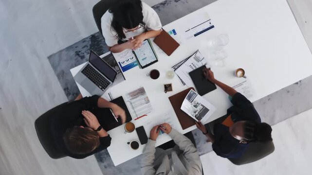 Above, meeting and planning with business people in office for team, budget discussion and documents. Account analysis, risk management and collaboration with employees and tech in agency for report