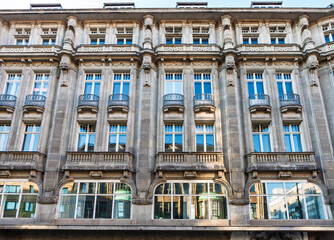 Old Multi-story housing complex with balconies on Kochstrasse (street) close to Checkpoint Charlie.