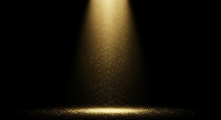 A dramatic golden spotlight illuminates a dark stage with shimmering particles creating a magical and ethereal atmosphere for performance or celebration