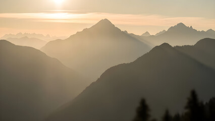 Golden sunlight illuminates layered mountain ranges during a peaceful morning in a remote wilderness landscape. isolated on white background