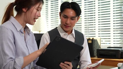 Business corporate team brainstorming, planning strategy having a discussion Analysis investment researching with chart at office desk documents in office. - Powered by Adobe