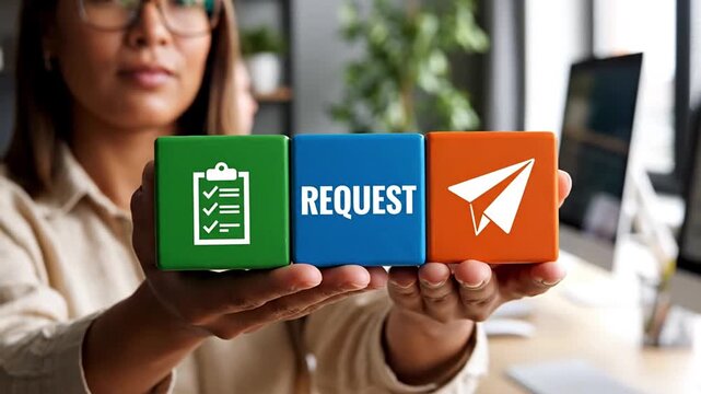 Close-up of a woman in an office holding three blocks: green with a checklist, blue with "REQUEST", and orange with a paper airplane. Conceptual image for submitting requests, applications, or sending