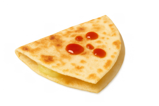 Savory crepe creating a quick meal or appetizer, featuring a golden-brown surface and vibrant drops of ketchup