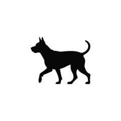 Silhouette of a dog walking with its tail up