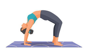 Woman practicing yoga doing wheel pose on the mat
