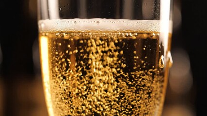 Refreshing Beer in a Glass CloseUp of Bubbles and Foam Golden Liquid Texture and Celebratory Drink for Social Gatherings and Relaxation Moments.