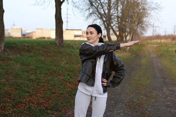 Woman doing morning exercises outdoors