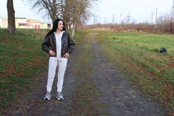 Woman doing morning exercises outdoors