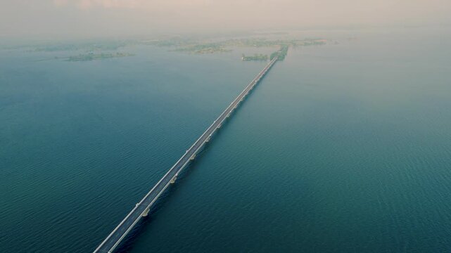 Aerial drone view of the iconic Gaman Bridge (Maharana Pratap Setu) in Banswara, Rajasthan, India, offering a unique experience over the scenic Mahi River and its natural surroundings.	