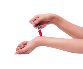 Woman testing vibrant red lipstick on her hand, a beauty product demonstration.