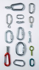 Assortment of metal carabiners eye bolts and connectors arranged on a white background