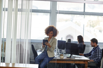 Creative agency, happy woman or reading with tablet in startup, market research or fact check for...