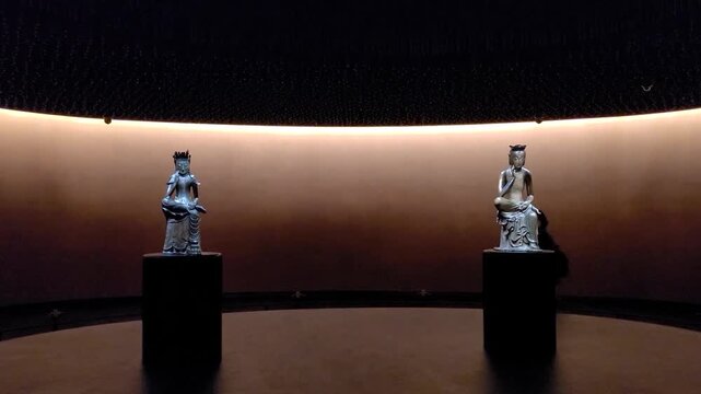 National Museum of Korea's Pensive Bodhisattvas (National Treasure), displayed in the dimly lit Room of Deep Contemplation.
