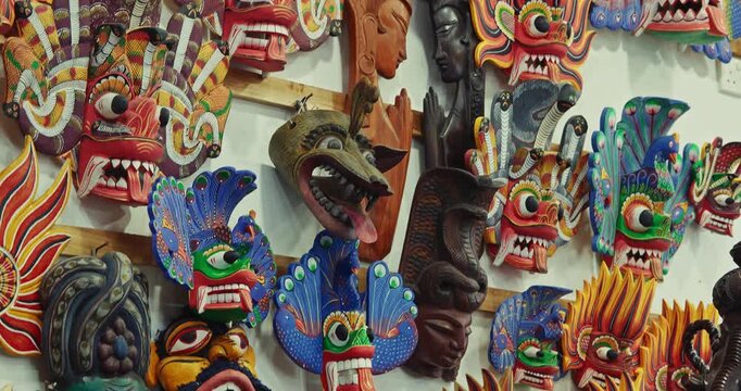 Many old colored Ceylon traditional Wooden masks Sculptures. Sri Lankan Flower Bird Devil (Mal Gurulu Raksha), Fire Devil mask, Gini Raksha, Naga Raksha - Cobra demon - mask of the Raksha Kolama demon
