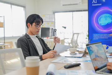 Business professional concentrates in coworking space leveraging AI powered virtual assistant and realtime big data analytics on laptop display for hyper automated workflow intelligence optimization	