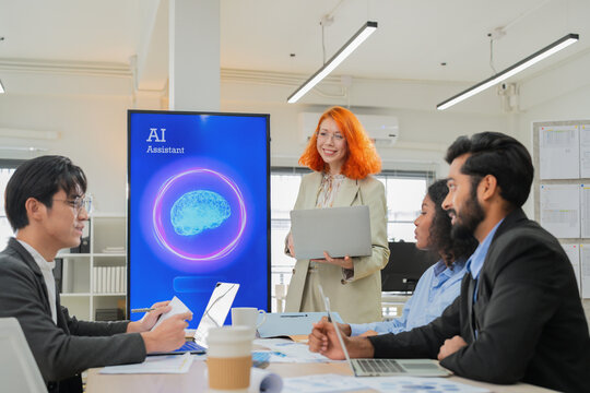 Multiethnic business professionals collaborate in modern office using AI virtual assistant and big data analytics to connect insights, driving strategic innovation through intelligent automation	