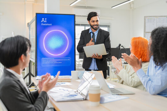 Multiethnic business professionals collaborate in modern office using AI virtual assistant and big data analytics to connect insights, driving strategic innovation through intelligent automation	