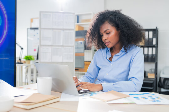 Diverse business professionals, both male and female, collaborate in a bright modern office, using an AI powered virtual assistant to brainstorm innovative ideas, analyze big data insights	