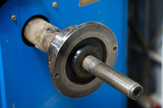 Metal bushing from a wheel balancing machine