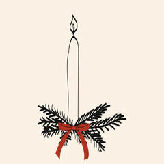 Simple candle decoration with pine branches and a red ribbon adding warmth to a cozy setting during winter festivities