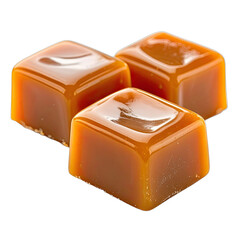 Three rich, glossy caramel candies isolated on a black background.