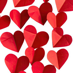 A striking pattern of deep red, three-dimensional paper hearts set against a stark black background.