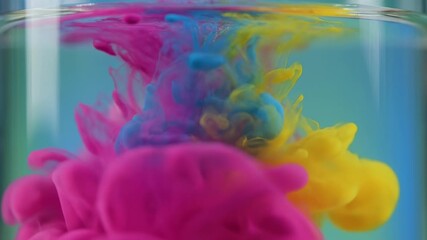 A simple, clear name for this image could be Colorful tropical fish swimming in a blue underwater coral scene