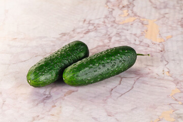 Ripe green raw two cucumbers