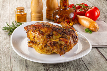 Baked in oven whole chicken with spices