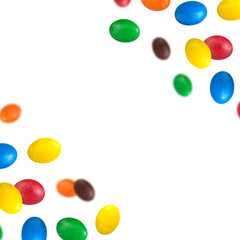 Colorful chocolate dragee levitation around the frame — real photo with central copy space on transparent background.