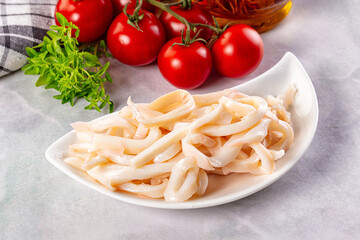 Canned marinated squid rings heap