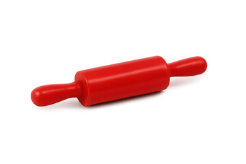 Red plastic rolling pin on transparent background, kitchen utensil for baking and preparing dough