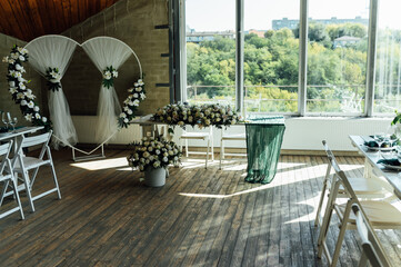 Elegant festive table setting with green decor and glassware