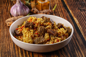 Asian traditional pilaf with beef