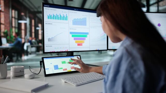 Data Analyst Checking Busy Schedule With Online Meetings And Appointments - Powered by Adobe